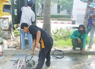 Workers repair the city’s CCTV cameras along Beach Road ahead of last week’s music festival.